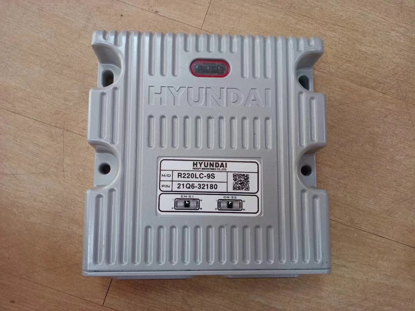 Hyundai R220LC-9S ECU controller 21Q6-32180 showing the product label and connector housing